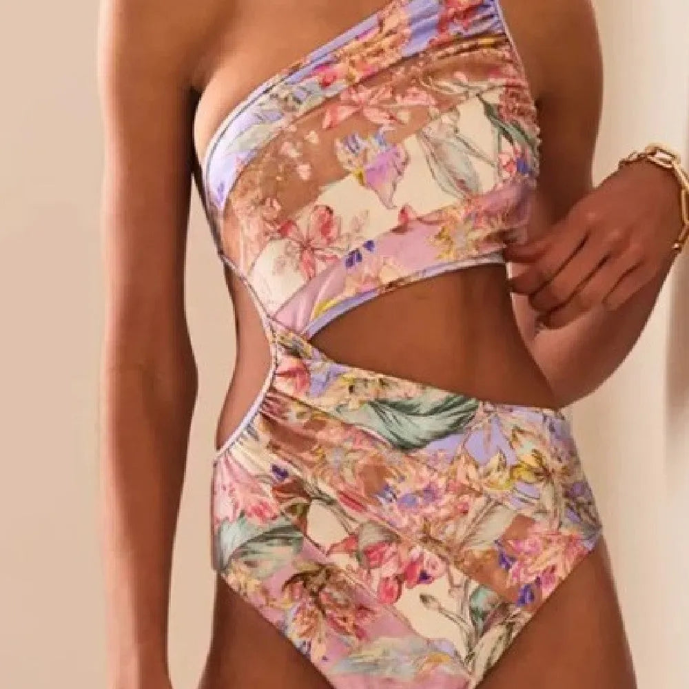 Rose gold patterned women's swimsuit in polyester fabric on mannequin