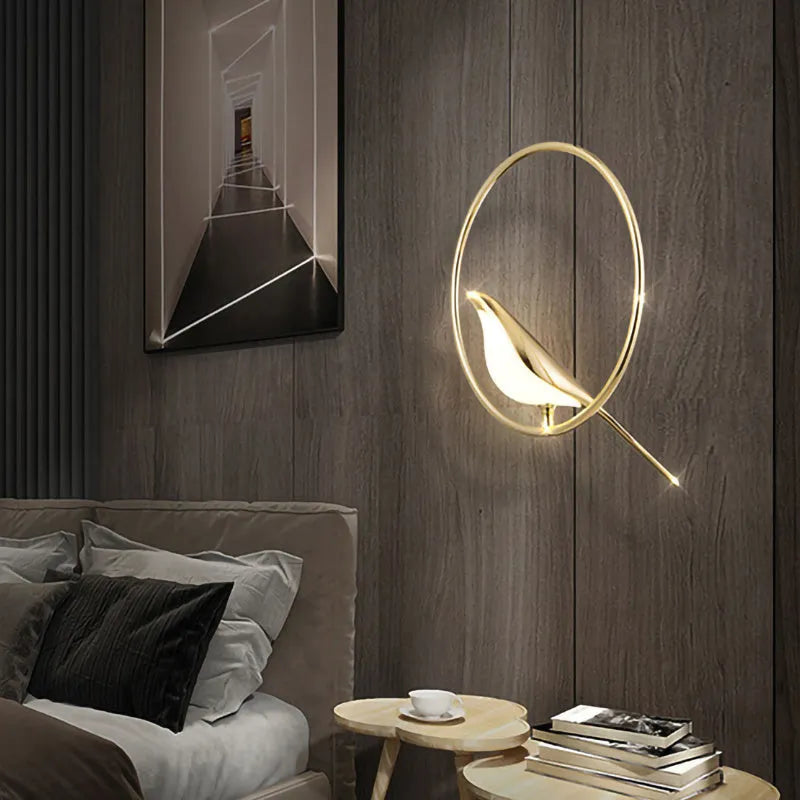 Modern silver magpie bird chandelier with long 150cm drop and clear acrylic details, hanging from a ceiling.