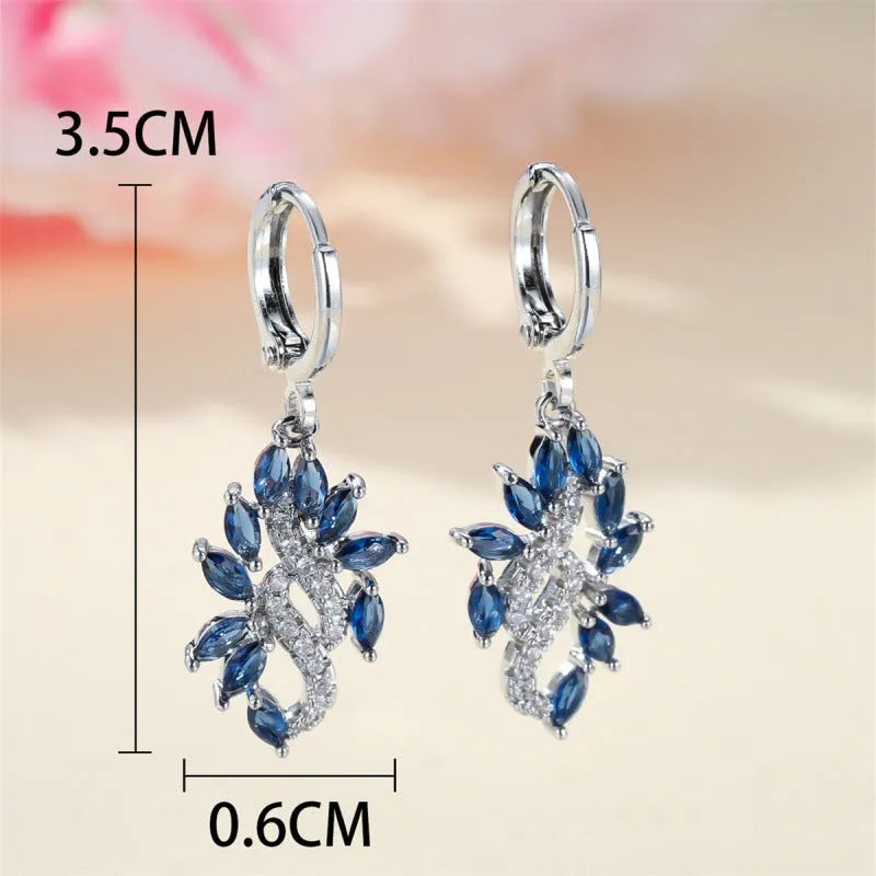 Women's sapphire blue alloy drop earrings with ethnic design elements