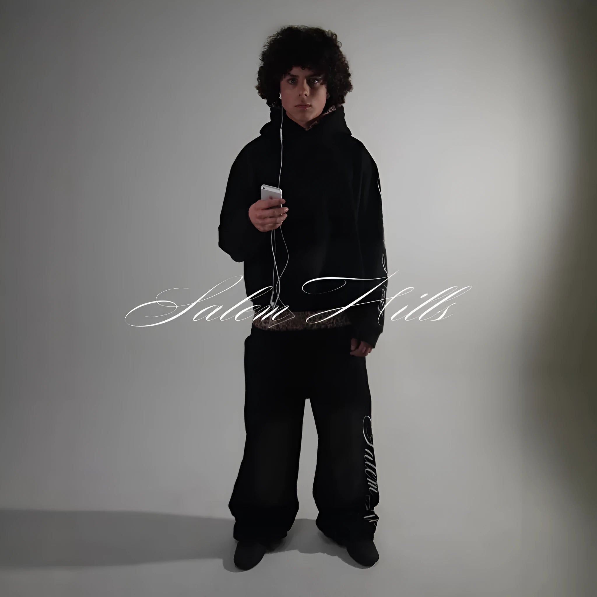Men's grey fleece-lined hoodie tracksuit set with black punk print design on sleeves and pants