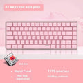 82-key metal mechanical keyboard with white backlight beside laptop