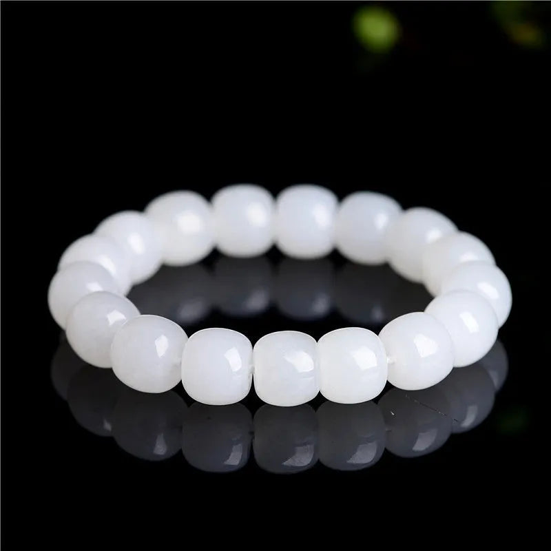 White Hetian jade barrel bead bracelet for men and women showing bead size options.