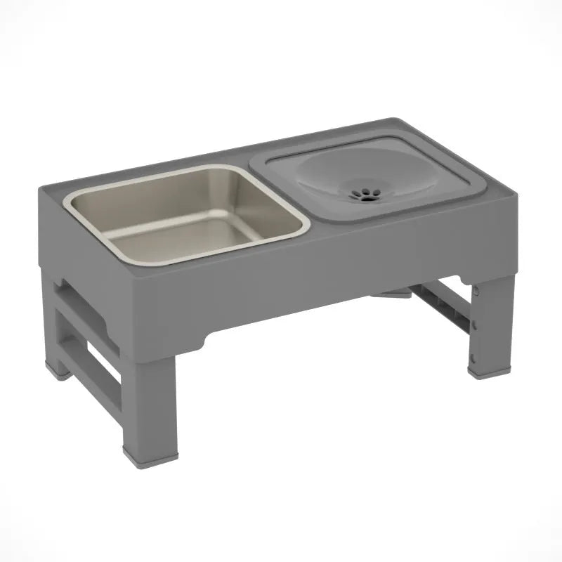 Black adjustable height dog feeding stand with two stainless steel bowls elevated on plastic stand