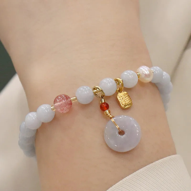 Women's gold-plated bracelet with artificial crystal and chalcedony pendant in climbing cat design
