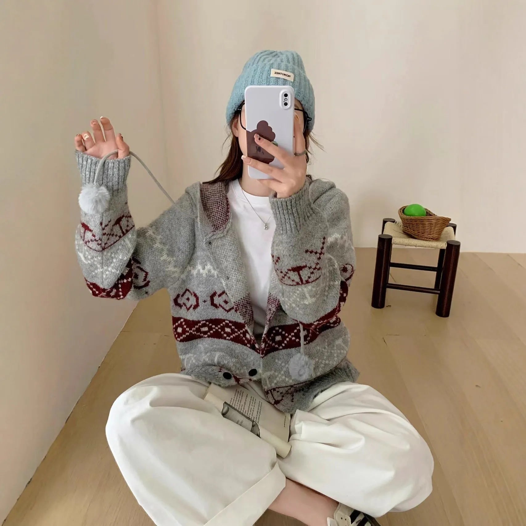 Geometric patterned acrylic brocade sweater coat in grey, loose fit with long sleeves.