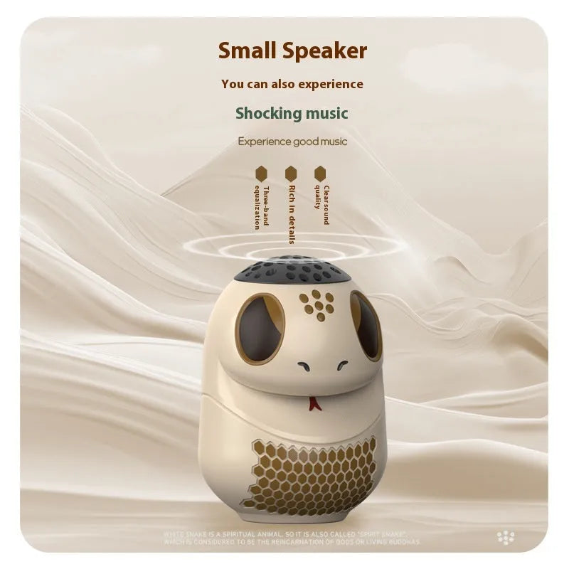 TK900 White cartoon-design Bluetooth speaker with waterproof construction and lighting effects