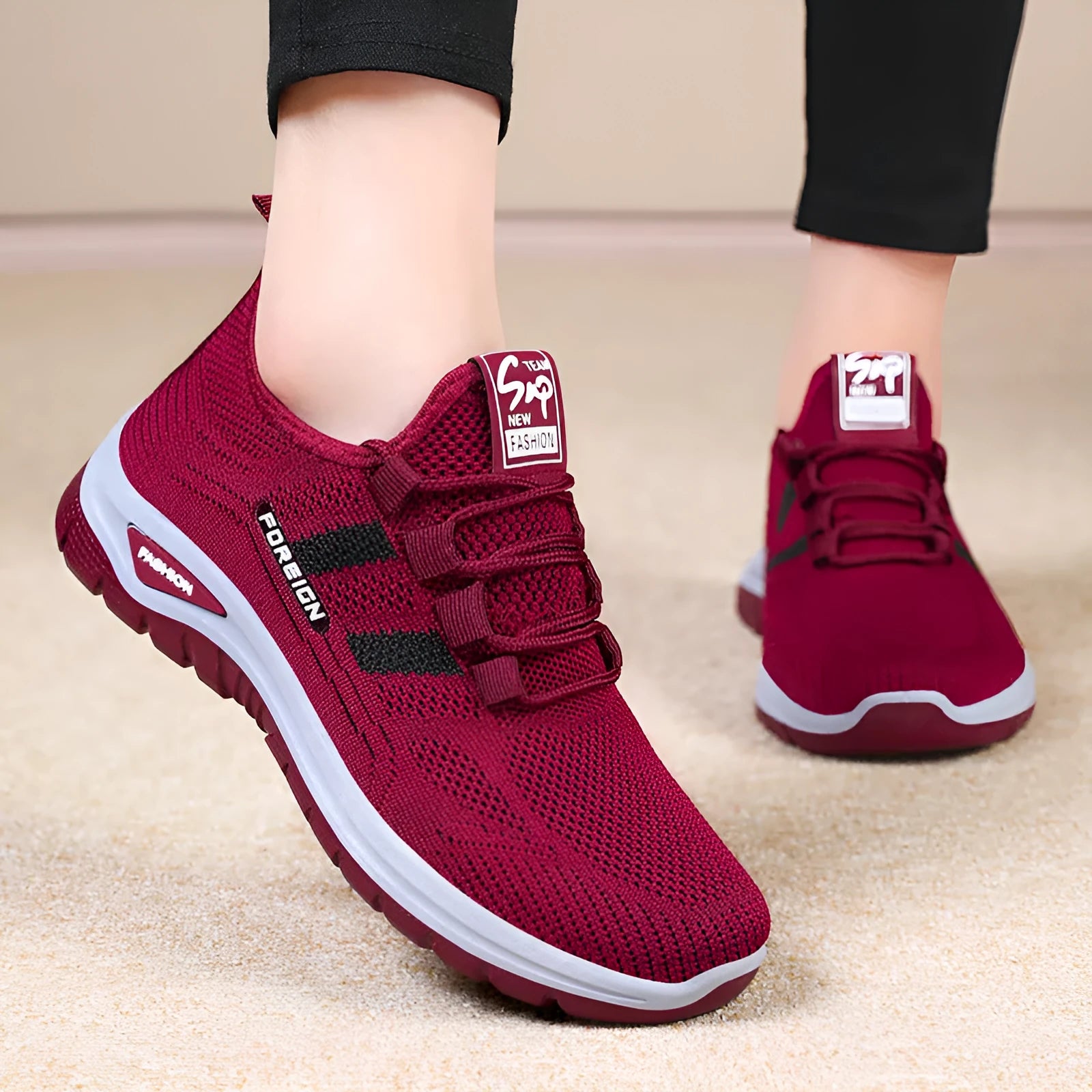 Low-top casual shoes with breathable mesh upper and flat PVC sole in black, grey, purple, or red.