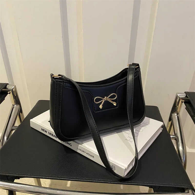 Western-style shoulder bag with bow decoration in multiple colours showing 24x14x5cm dimensions