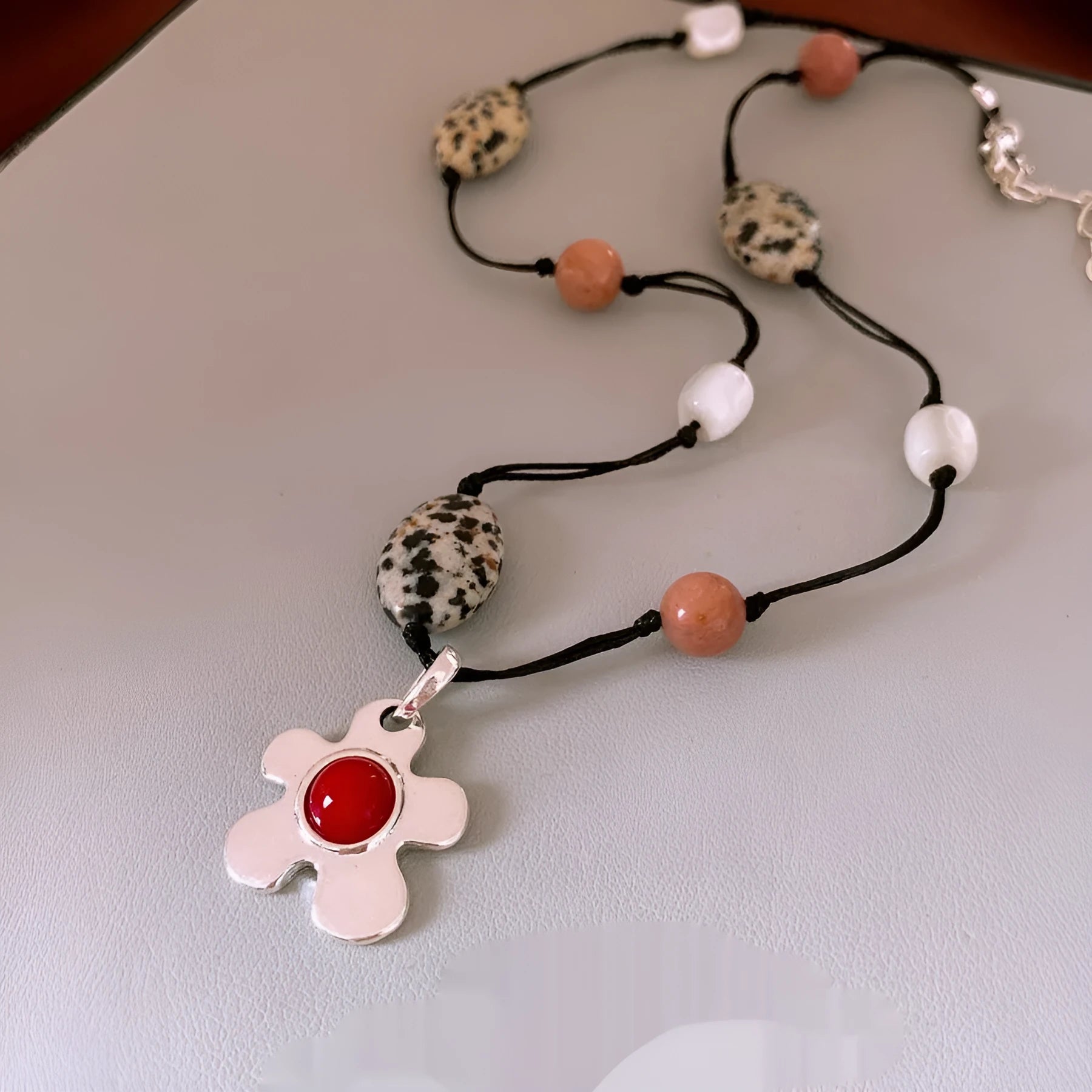 Stone shell beaded flower pendant necklace on adjustable chain with ethnic style design