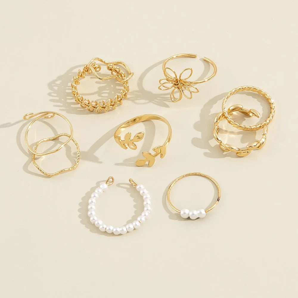 Gold colour openwork flower ring for women with glossy electroplated finish