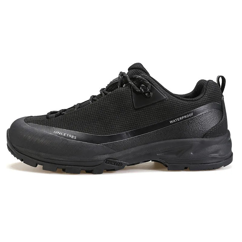 Men's low-top hiking boots with leather mesh upper and non-slip rubber outsole in dark gray colour