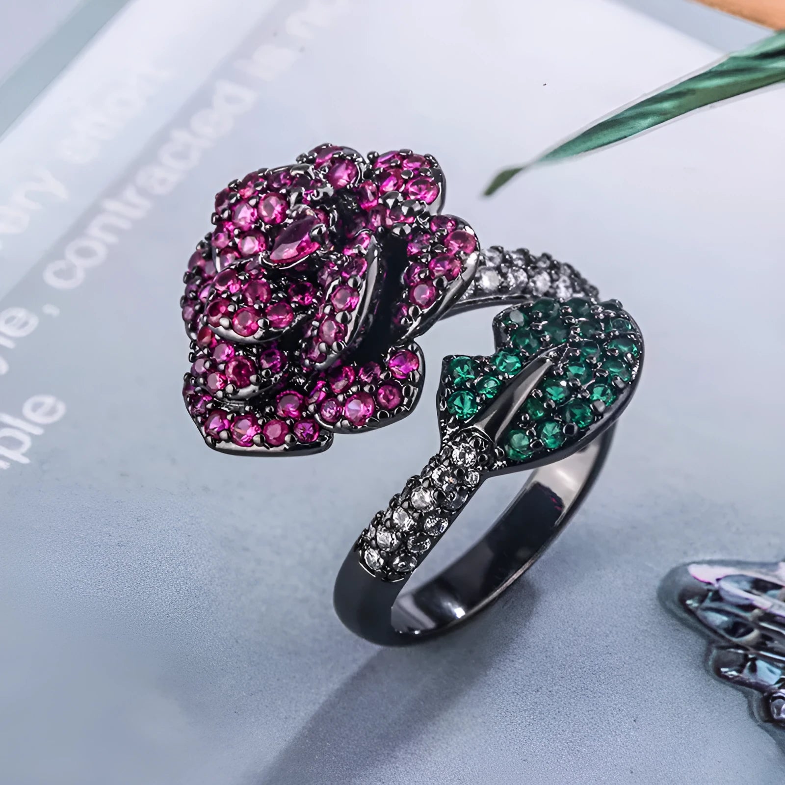 Geometric flower personality ring with gold-plated copper construction and red corundum centrepiece
