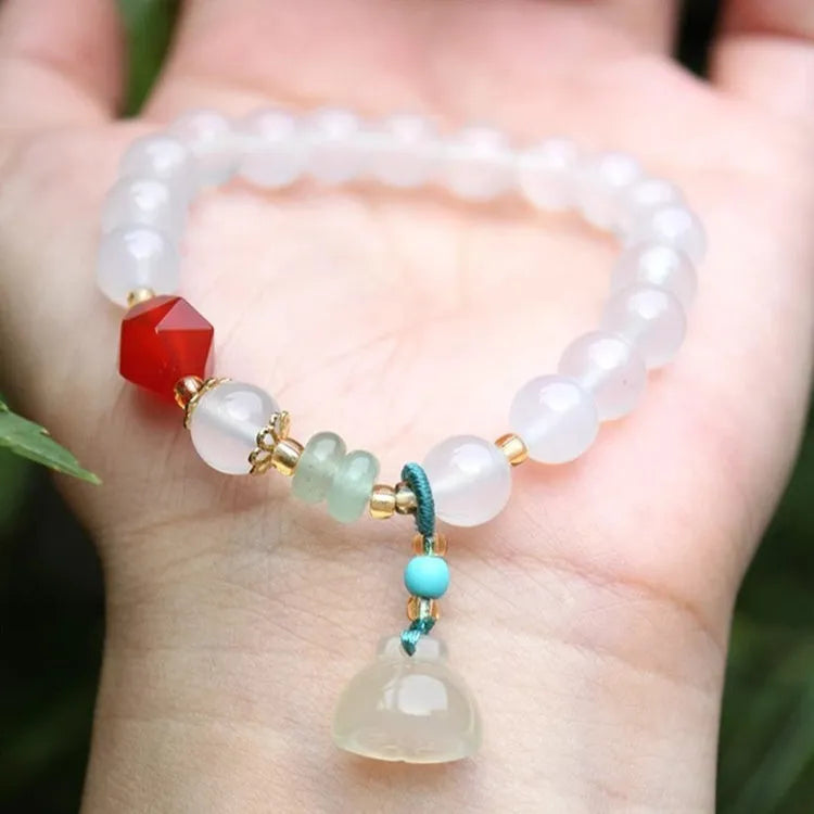 Hand-woven Agate lotus seedpod bracelet with Tian Shan Cui beads in geometric pattern