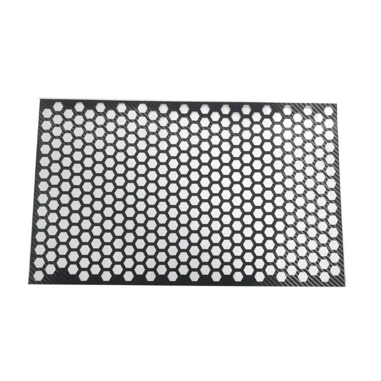 Ten honeycomb-patterned car taillight stickers in three colour options on 48cm by 30cm vinyl sheets