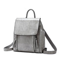 Large black genuine leather women's backpack with soft handle, double straps, and visible stitching.