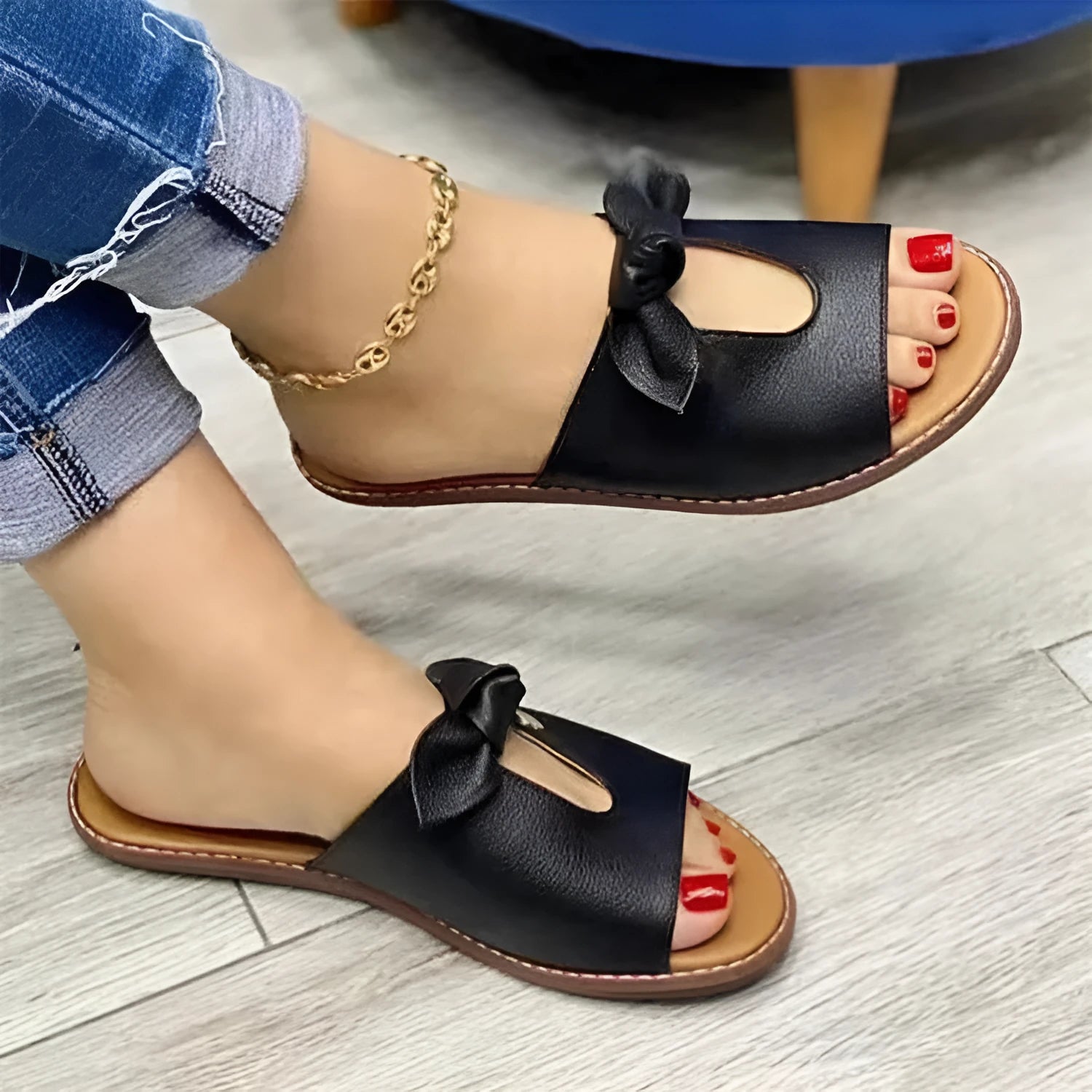 Ladies casual sandals with bow detailing on fish mouth slipper style in black, pink or gold colours