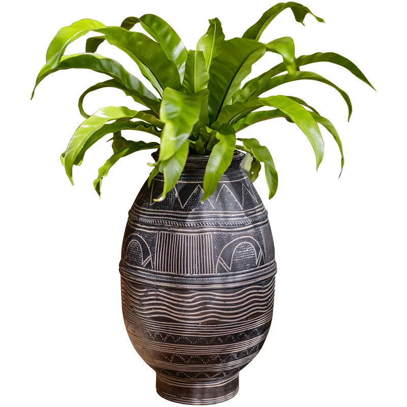 Medium cement flower pot with African ancient tank design and punched drainage base