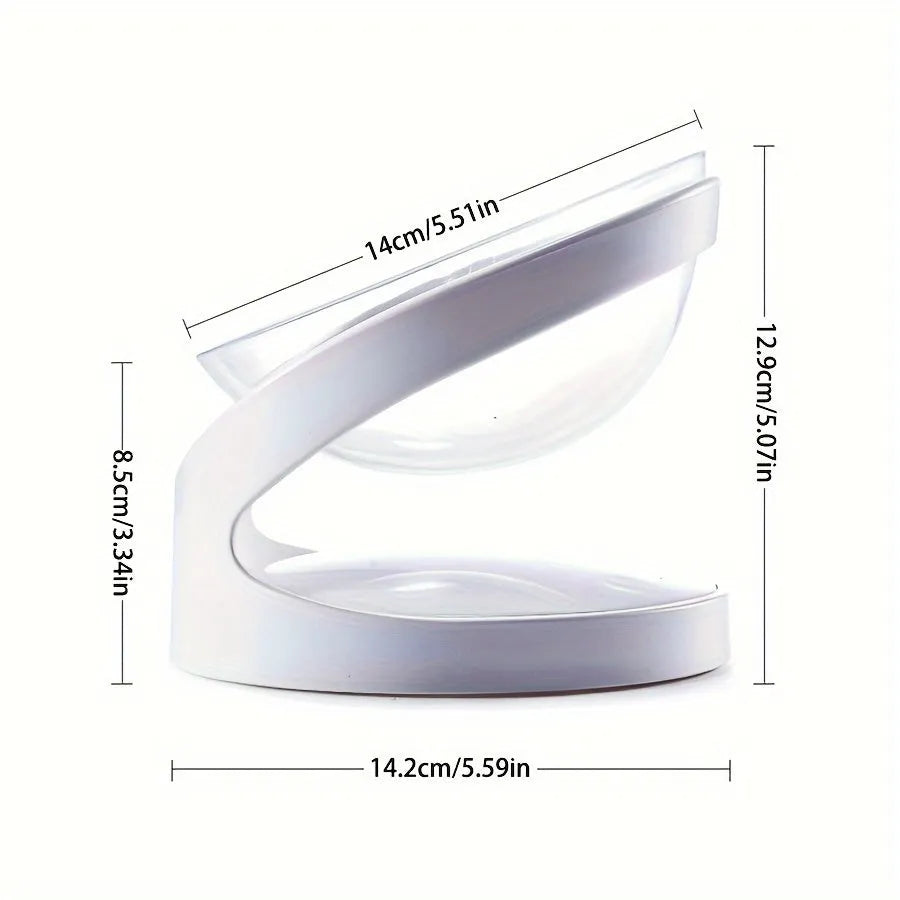 White elevated clear plastic cat food bowl with a tilted feeding surface for neck support.