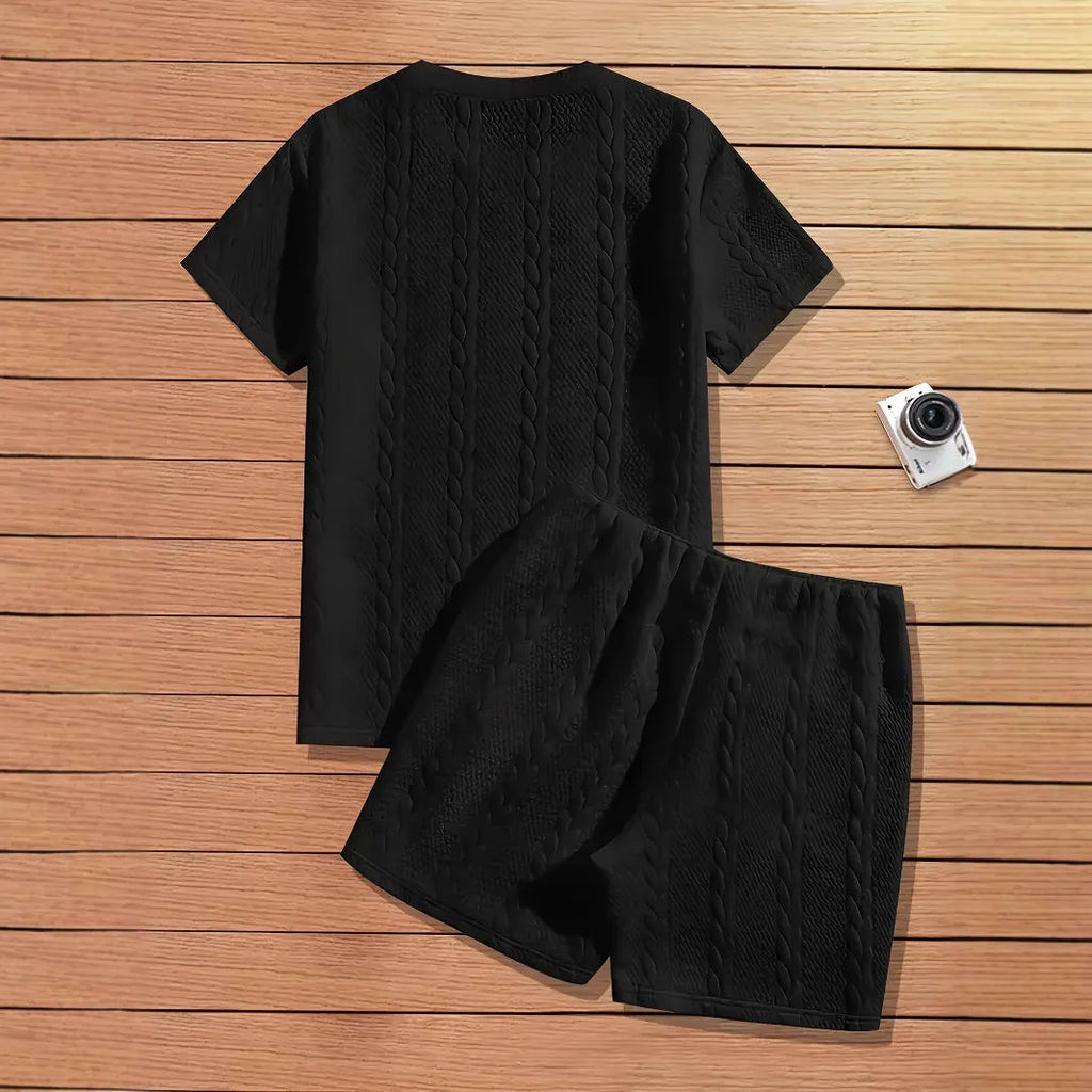 Men's black sportswear set with patch design showing T-shirt and matching shorts