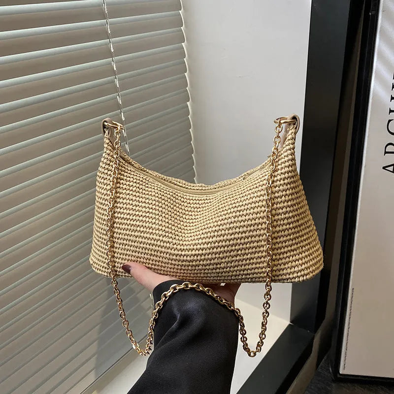 Woven straw crossbody handbag with horizontal square shape and phone compartment