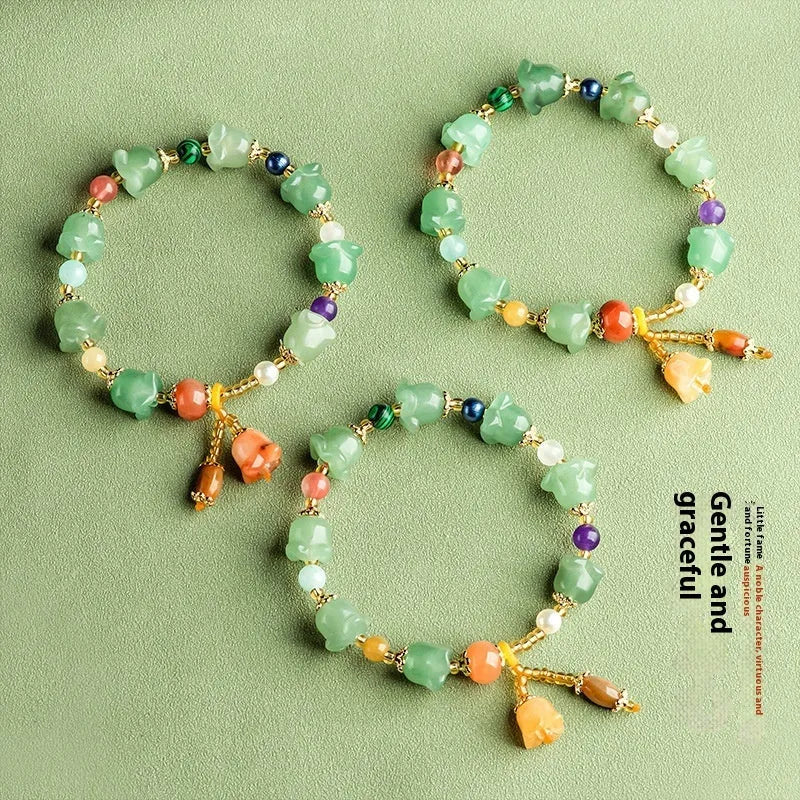Natural Xinjiang Jinsi Jade bracelet with carved orchid beads in aventurine orchid colour for 14-18cm wrists