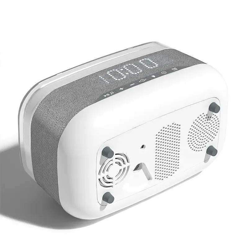 White multifunctional alarm clock with Bluetooth speaker, wireless charging pad, and night light.