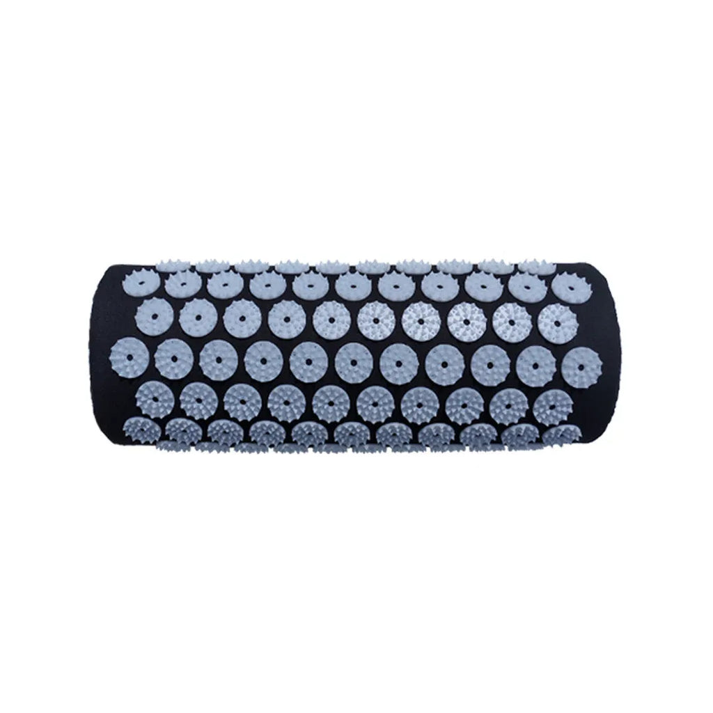 Black and blue acupuncture massage mat set with cushion and headrest on floor for yoga and massage