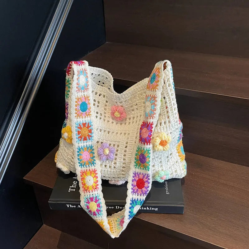 Women's woven hollow knit beach shoulder bag in milky white colour with single strap
