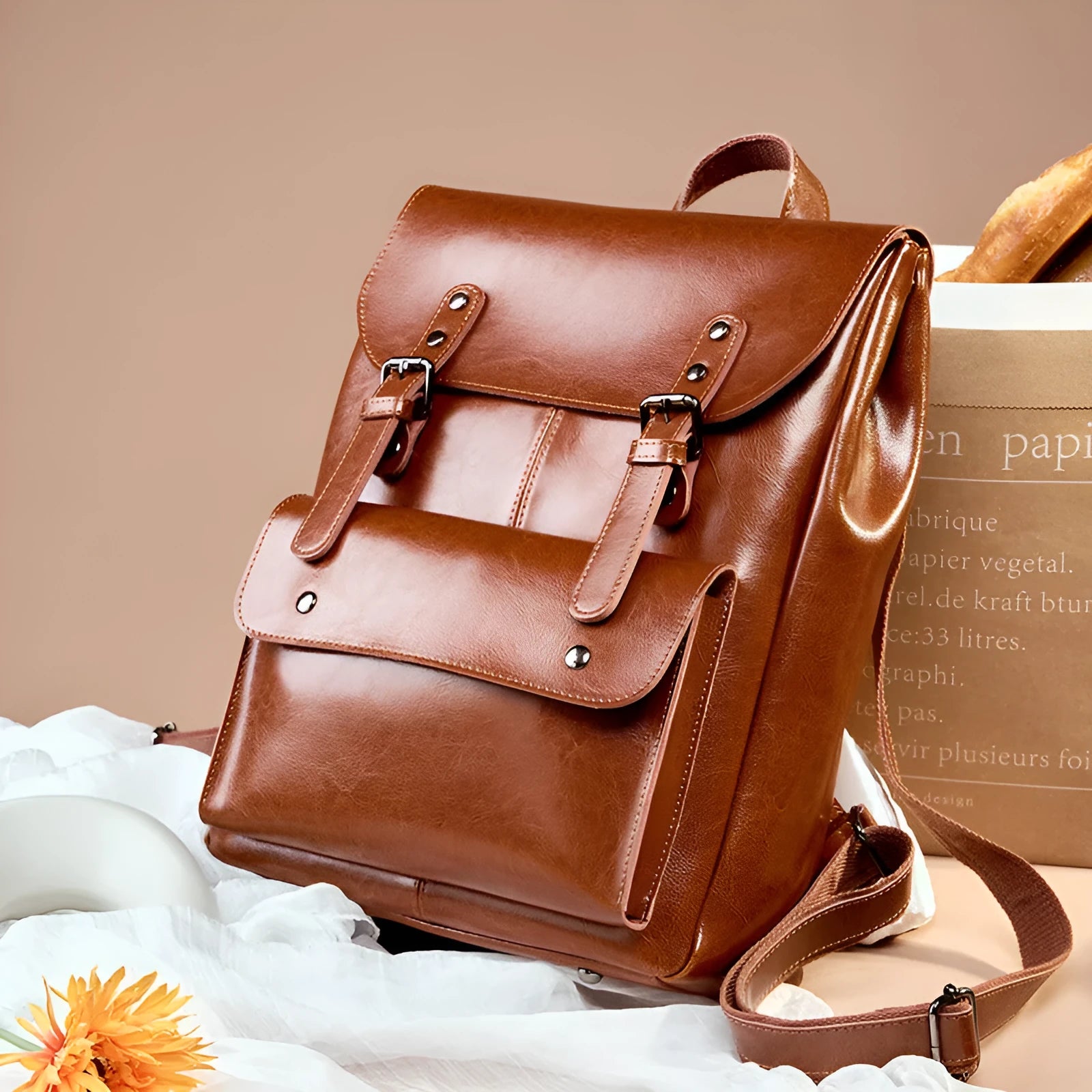 Black genuine cowhide leather computer backpack for women with hard construction.