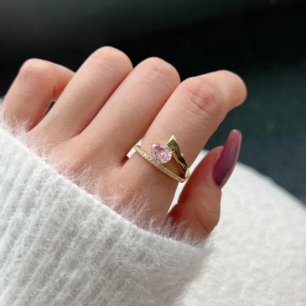 Women's ring with water drop diamond shape, silver electroplated finish, geometric design, available in multiple colours and sizes