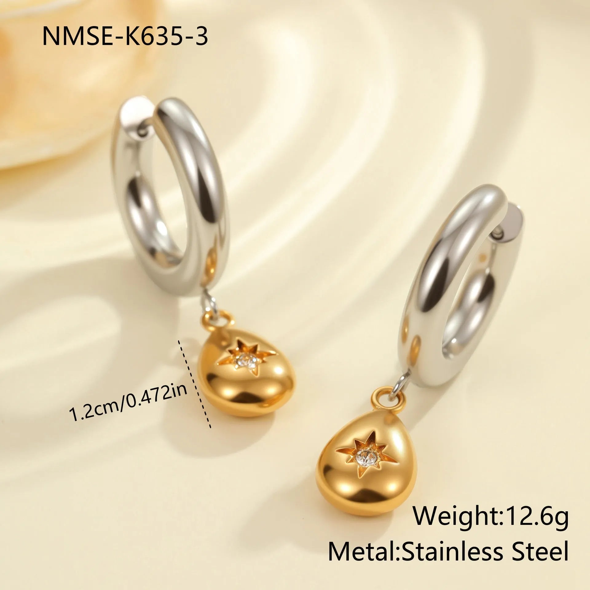 Women's stainless steel earrings with 18K gold plating in heart, star, and Christmas tree shapes.
