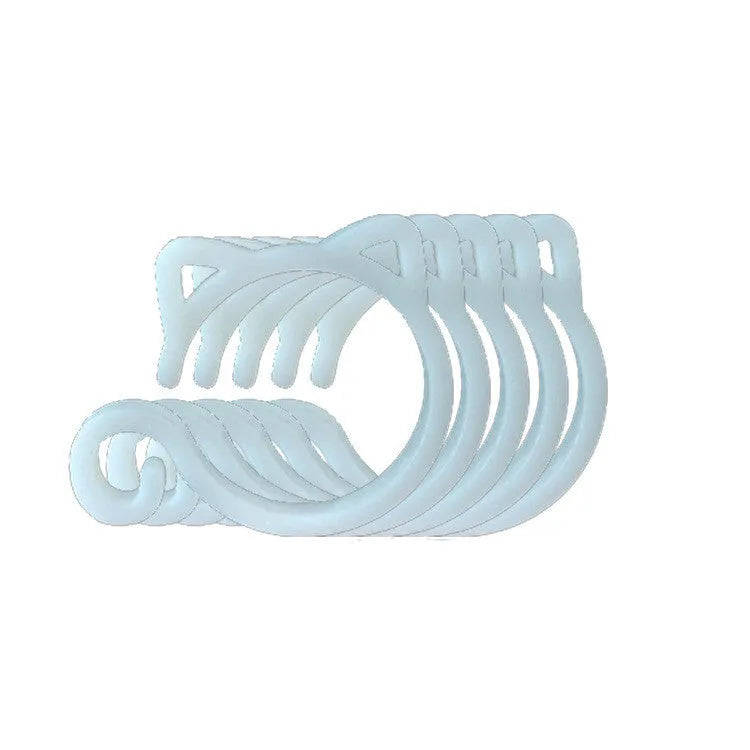 A colourful cat-shaped plastic clip for securing plant stems in the garden.
