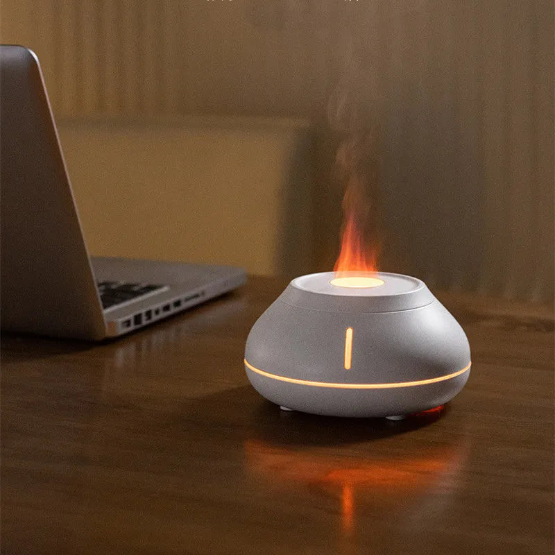 Colourful flame simulation aroma diffuser humidifier in black resin with LED lighting effect