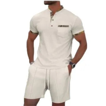 Men's grey zip-up polo collar short sleeve top and shorts tracksuit set laid flat.