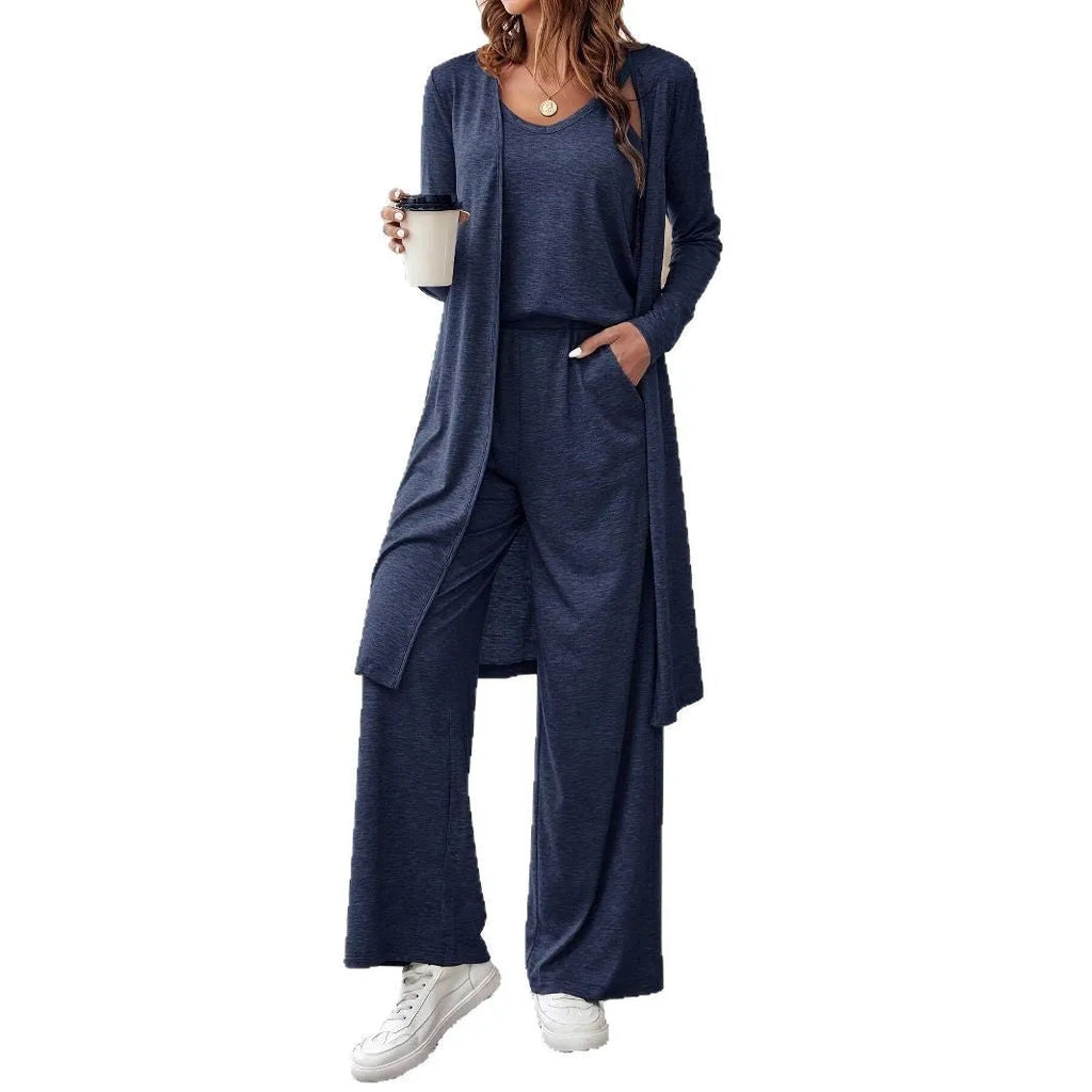 Blue women's three-piece casual suit set with trousers, top, cardigan, and suspenders laid flat.