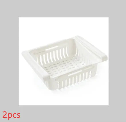 Blue telescopic plastic storage basket for refrigerator organisation with fruits and vegetables inside.