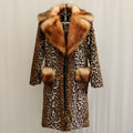 Women's long leopard print artificial fur jacket on a hanger, showing regular sleeves and full length.