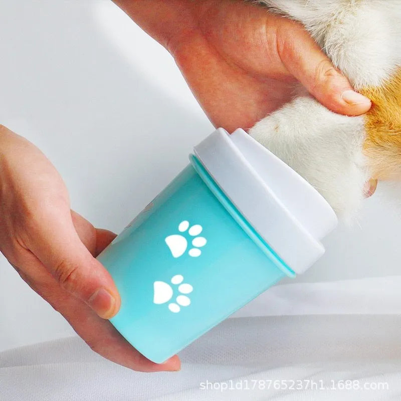 Dog foot washing cup in green, pink, and blue with silicone insert for paw cleaning