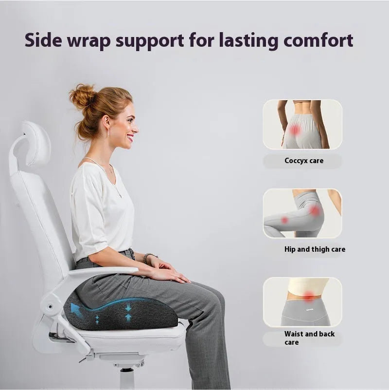 Light grey memory foam office chair seat cushion on a desk chair.