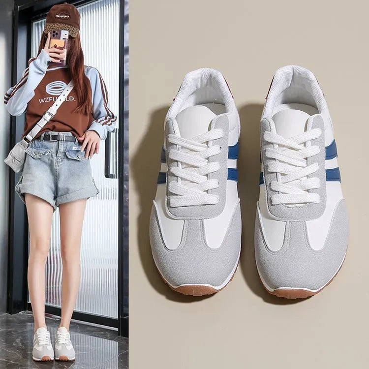 Blue and grey striped Cortez-style casual shoes with round toe and flat rubber sole