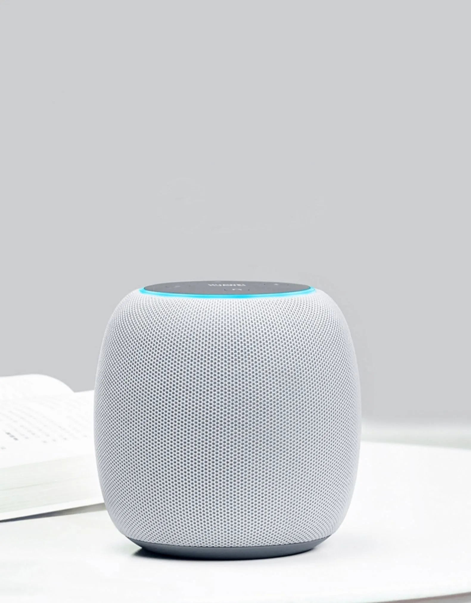 Compact AI smart speaker with voice control and Bluetooth connectivity