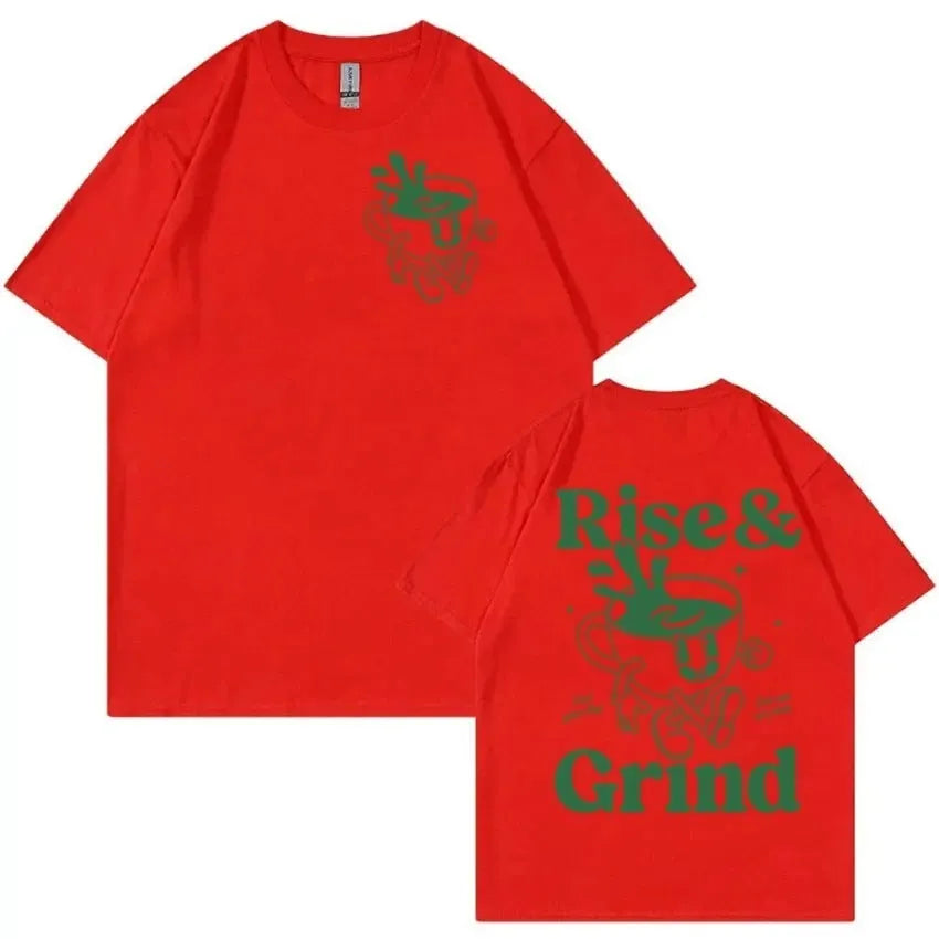 Loose fit linen t-shirt with a cartoon graphic of a green coffee bag and 'Rise And Grind' text.