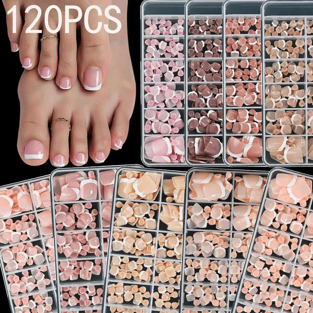 120 piece boxed set of full square short artificial toenails with French white edge design on nude base