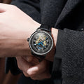 Men's stainless steel mechanical watch with a round dial, transparent case back, and a butterfly buckle.
