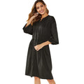 Black mid-length A-line women's dress with elastic cuffs and a cinched waist belt