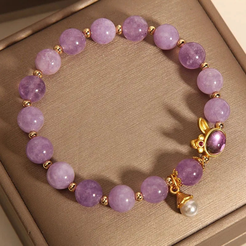 Mauve jade rabbit bracelet with crystal hare head design on adjustable wristband