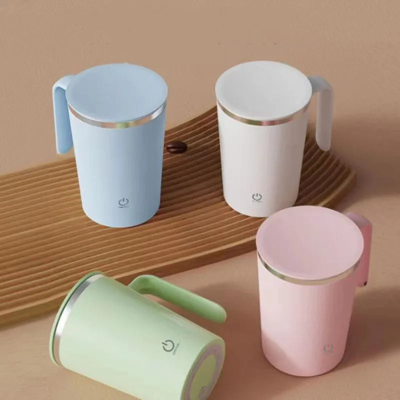 White automatic stirring electric mixing cup with minimalist design and USB cable.