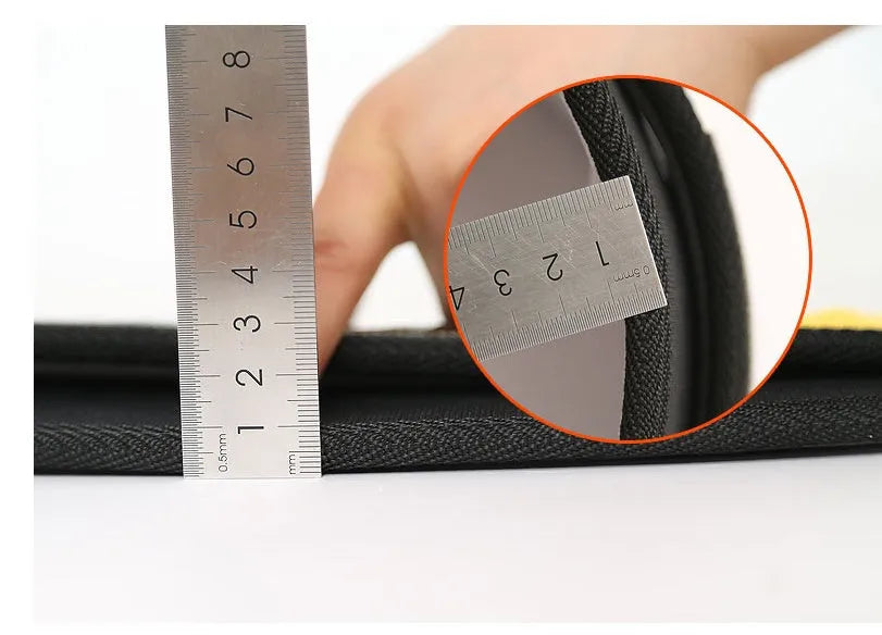 Black nylon fitness weightlifting waistband shown on an adult, adjustable and designed for support.