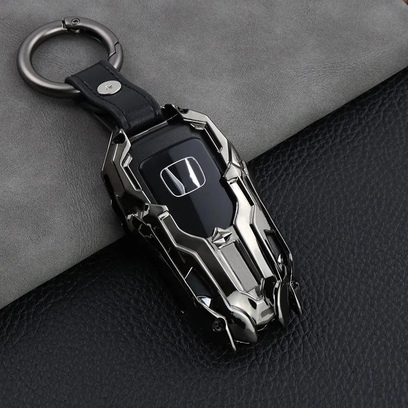 Black zinc alloy car key cover with highlight polish finish protecting a key fob