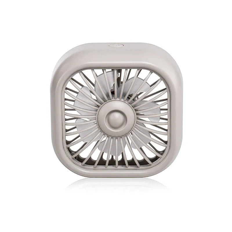 Small black USB car fan with three-speed keyboard controls on compact base